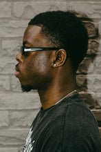 Load image into Gallery viewer, PANTHER BLACK. Don't wait any longer—try on The VIZOR and see the world through a lens of style and protection. Order your pair today and discover the perfect balance between fashion-forward design and superior functionality.